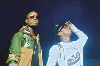 feat. Lil Wayne  - Strange Clouds