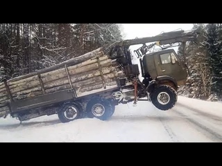 Груженый КАМАЗ валит на дыбах