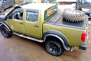 Nissan Navara. Крышка кузова пикапа из алюминия.